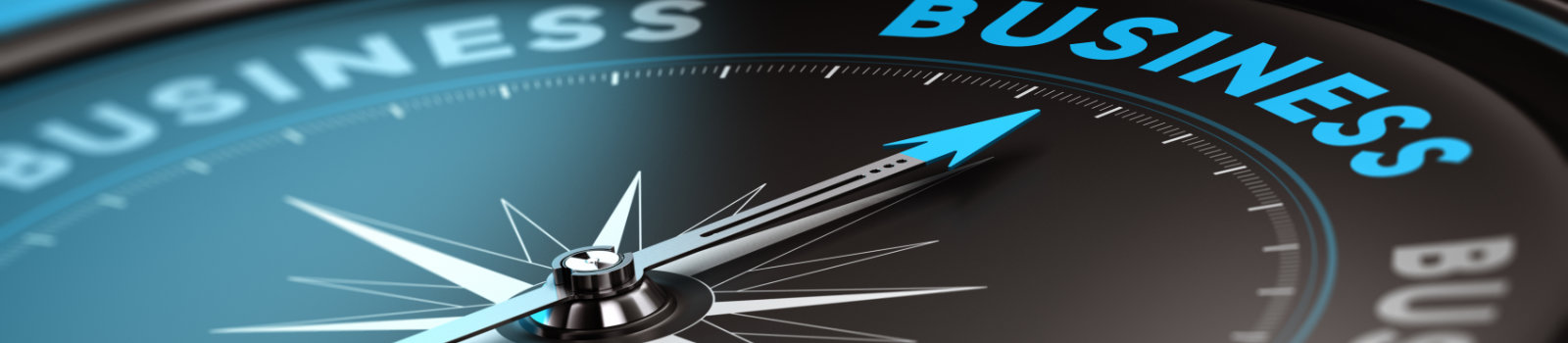Conceptual compass with needle pointing the word business, black and blue tones. Concept background image for illustration of business consulting.